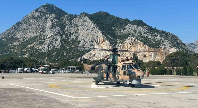 Konyadan havalanan AS-532 Couger tipi helikopter, tahliye çalışmalarına devam ediyor